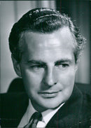 British film and television actor Derek Bond appears in a scene from the BBC's weekly television programme Picture Parade. - Vintage Photograph