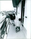 John Wayne and Ron John Ethan on the set of their upcoming film 'Strangeri H 4+%'. - Vintage Photograph