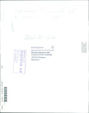 A fashion photographer poses with a model on a studio set. - Vintage Photograph