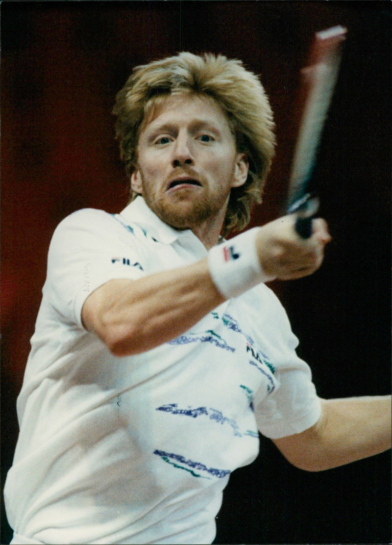 Tennis star Boris Becker poses for a photo during the Stockholm Open on October 29, 1992. - Vintage Photograph