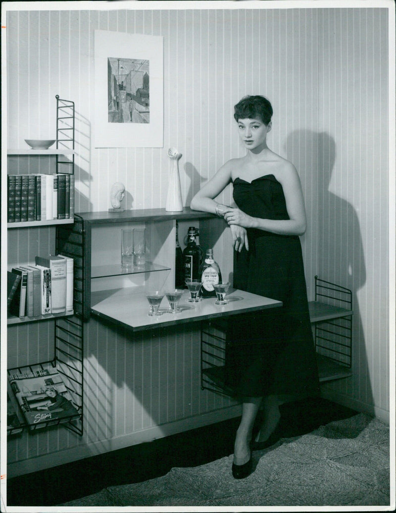 Lena Madsen models a 50s-inspired outfit during a photoshoot in Stockholm. - Vintage Photograph