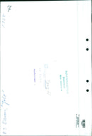 In a peaceful scene, a woman is seen standing in a field of bright yellow flowers, with a white house in the background. - Vintage Photograph