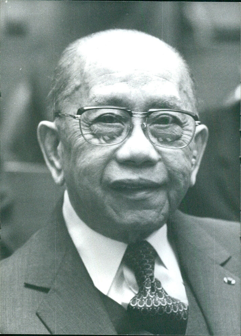 Brigadier-General Carlos Peña Romulo, Secretary of Foreign Affairs, is seen in an image captured by photographer Victor Lusinchi in Manila, Philippines in 1980. - Vintage Photograph