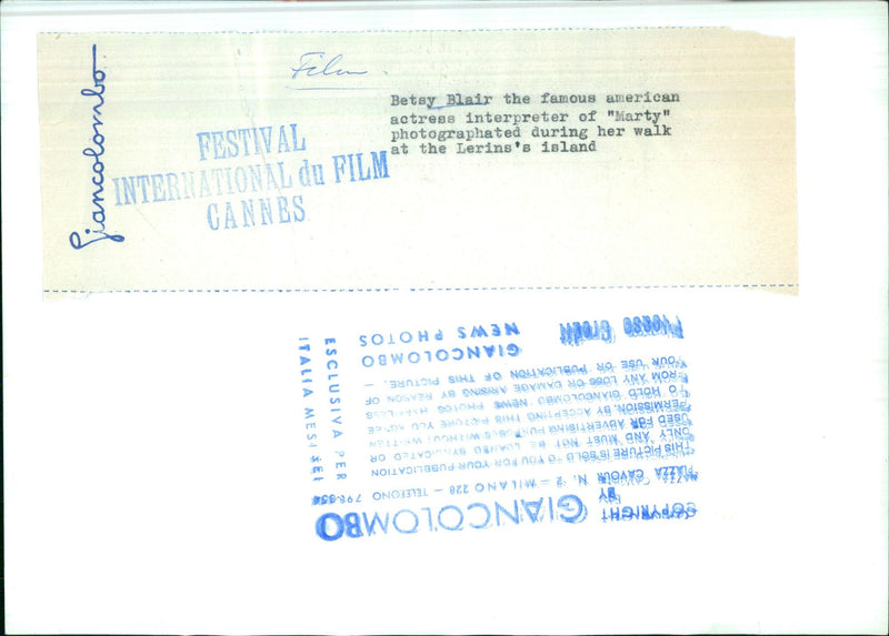 American actress Betsy Blair enjoys a walk on the island of Lerins during the Cannes International Film Festival in Italy. - Vintage Photograph