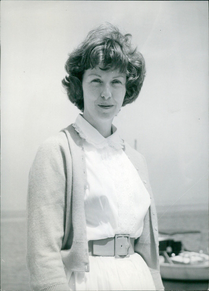 American actress Betsy Blair enjoys a walk on the island of Lerins during the Cannes International Film Festival in Italy. - Vintage Photograph
