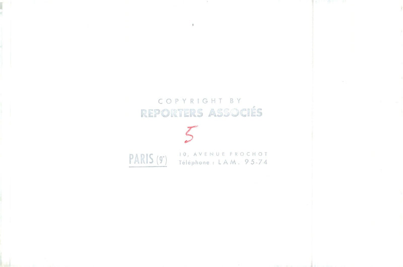 Members of the French press gather outside the Avenue Frochot in Paris to cover an event. - Vintage Photograph