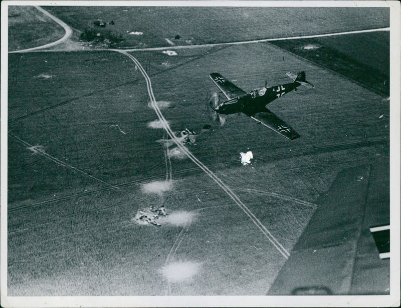 German fighter pilots complete a mission in the English Channel, conducting an aerial search of enemy territory on August 1940. - Vintage Photograph