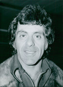 Legendary singer Frankie Valli poses for a portrait in Holland. - Vintage Photograph