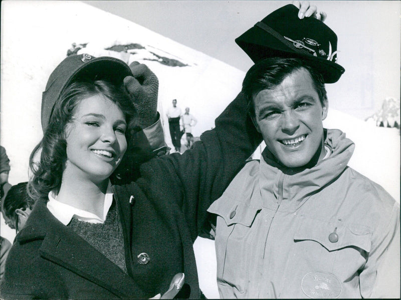 Bundes Vendarmerie Toni Sailer poses with the stars of the film "My Fill 100" in Paris. - Vintage Photograph