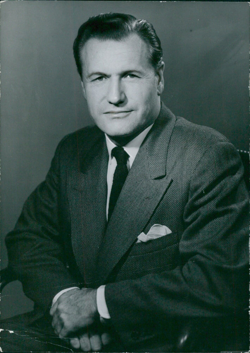 Nelson A. Rockefeller, Assistant to President Eisenhower, poses for a photograph at Deoffrade 59-53419. - Vintage Photograph