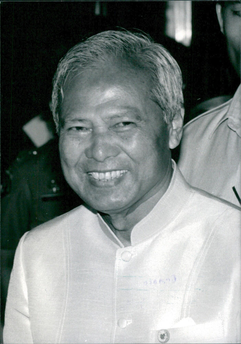 Former Thailand Prime Minister Prem Tinsulanonda attends a press conference in May 1986 after the split of his four-party coalition in a parliamentary vote of confidence. - Vintage Photograph