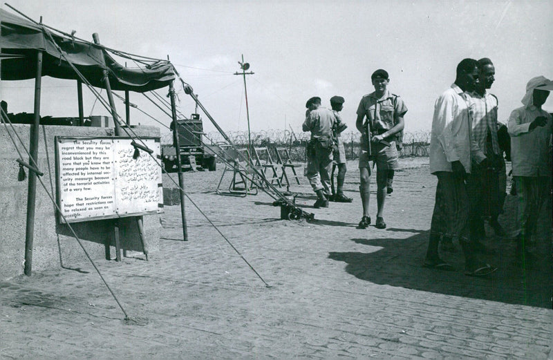 Security forces in Somaliland set up a road block to address the terrorist activities of a few. - Vintage Photograph