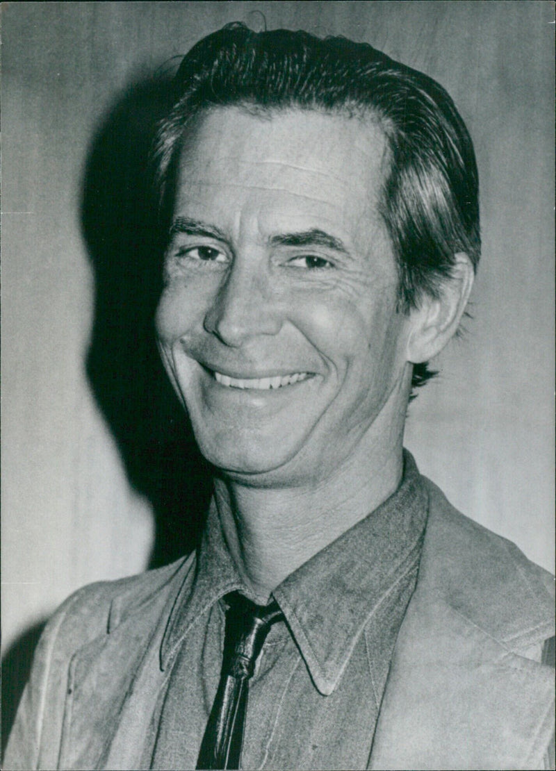 U.S. film star Anthony Perkins visits London on a three-month PR tour for his new movie, "Psycho II". - Vintage Photograph