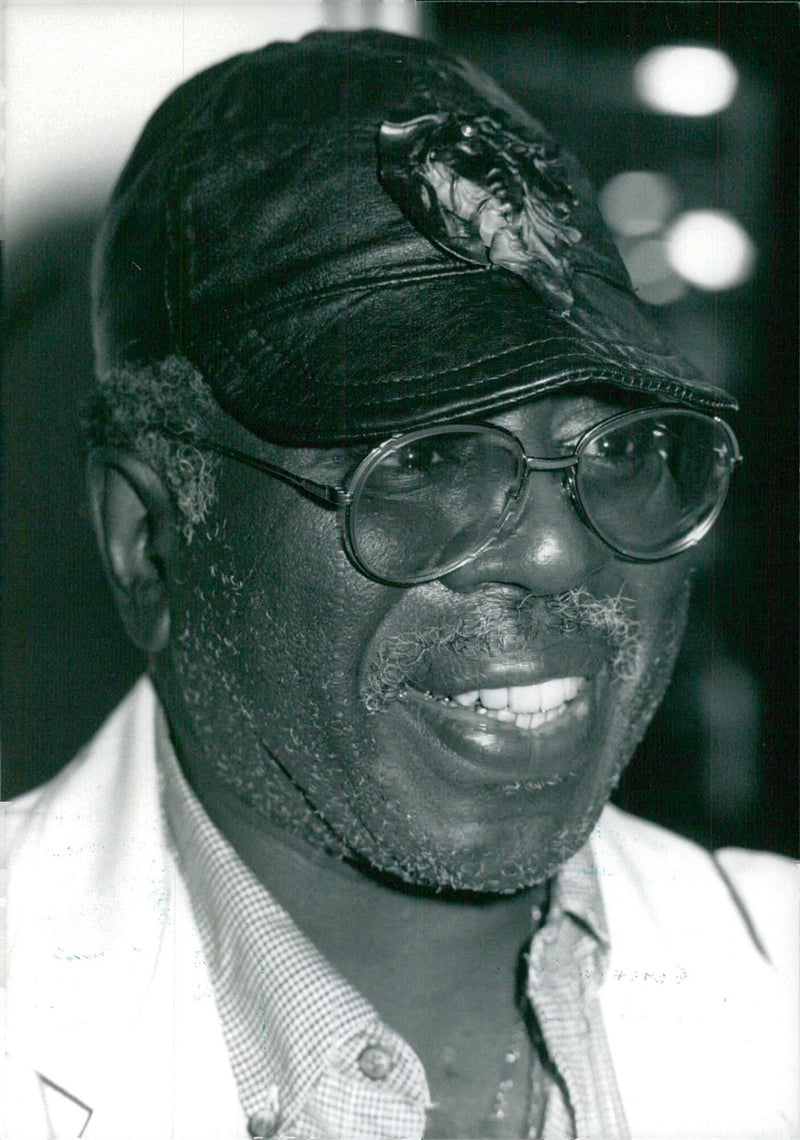 Iconic musician Curtis Mayfield performs on stage in 1988. - Vintage Photograph