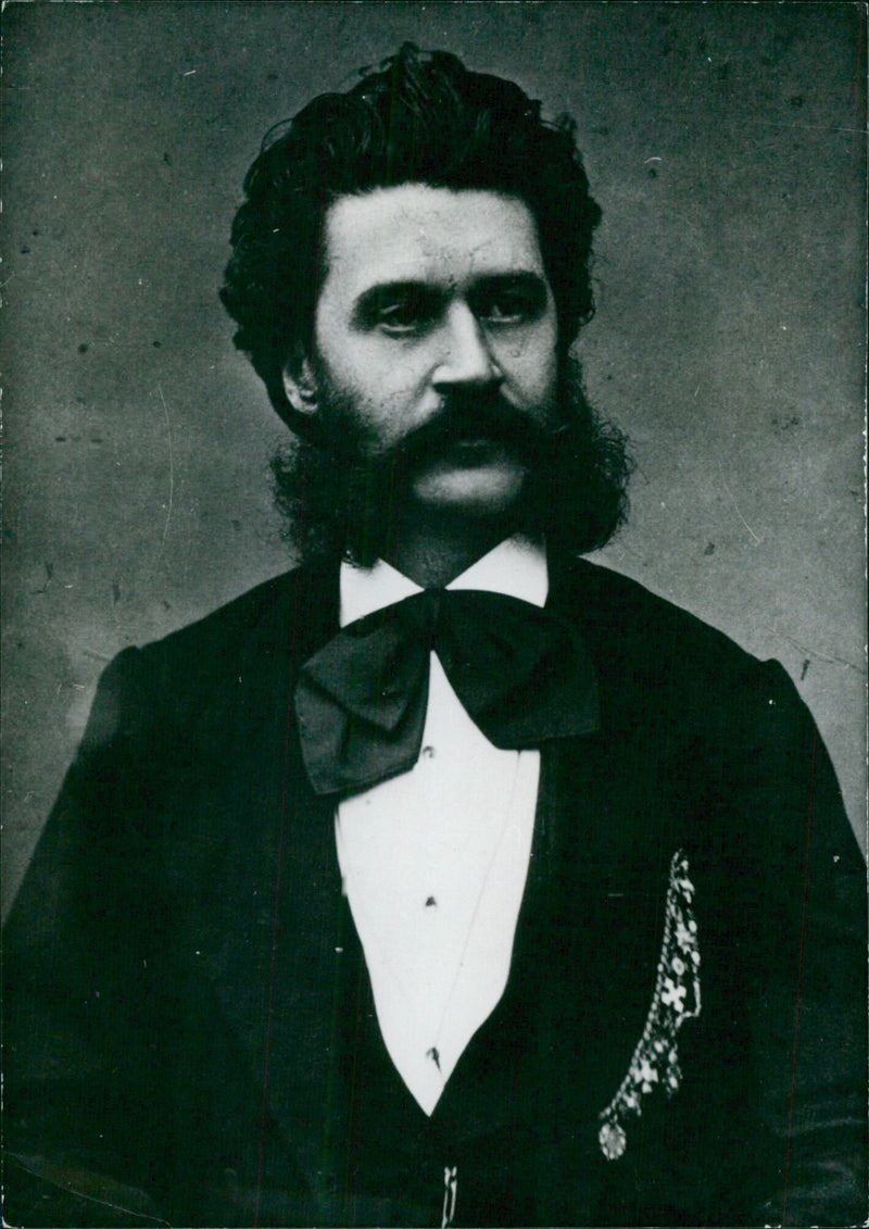 Johann Strauss, the renowned Austrian composer, is pictured in a historic portrait taken in 1899. - Vintage Photograph