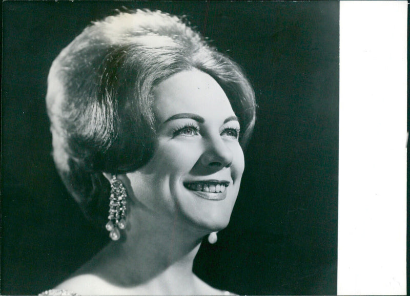 Renata Tebaldi, eminent Italian soprano, poses for a photograph during a performance in London. - Vintage Photograph