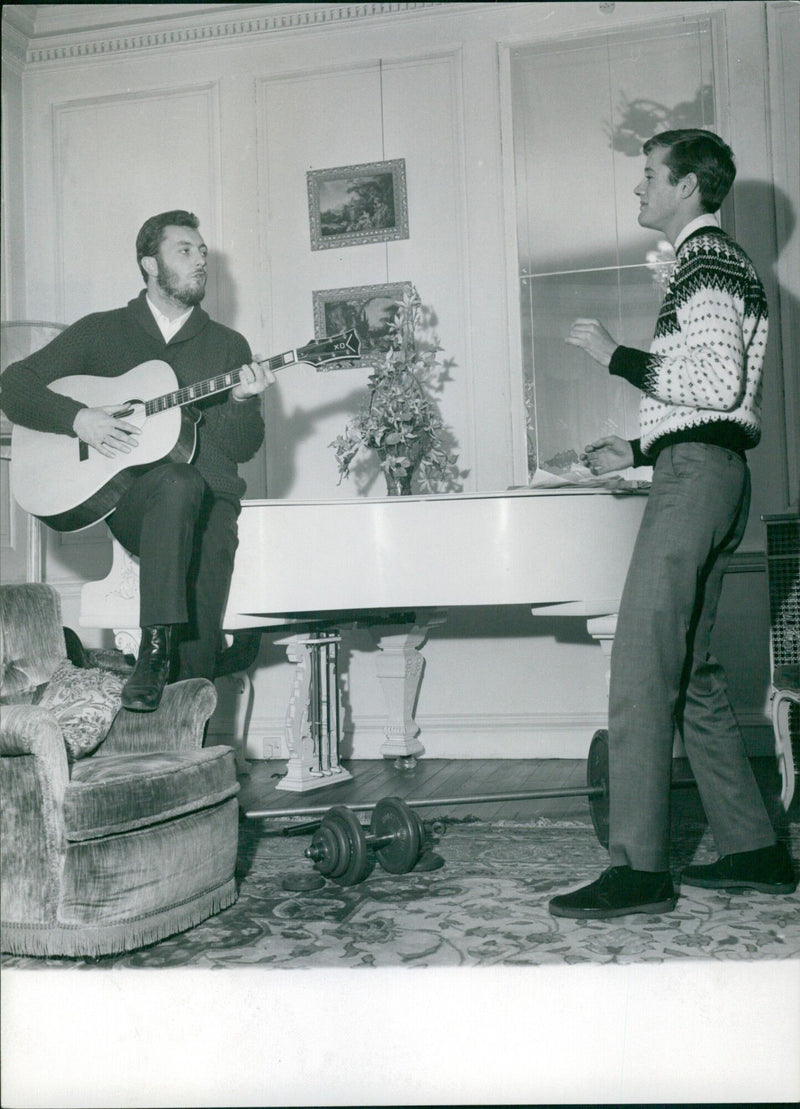 Actors Jim Mitchum and Peter Fonda are living together in London while they prepare to star in the upcoming film "Die Sieger". - Vintage Photograph