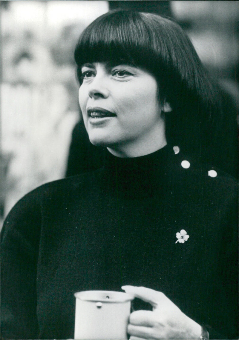 French singer and entertainer Mireille Mathieu performs onstage in London, 1968. - Vintage Photograph