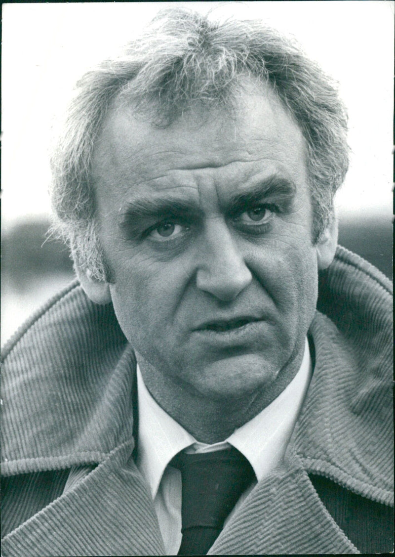 British actor John Thaw stars in two films based on the television series "The Sweeney", in which he plays Detective Chief Inspector Jack Regan. - Vintage Photograph