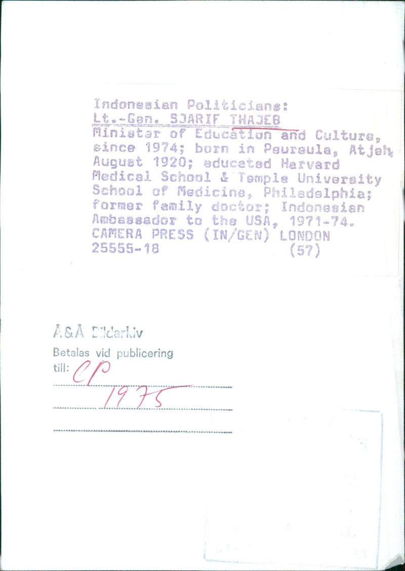 Indonesian politicians Lt.-Gen. SJARIF THAJEB, the Minister of Education and Culture since 1974, and CAMERA PRESS (IN/GEN) pose for a photograph in London, 1975. - Vintage Photograph