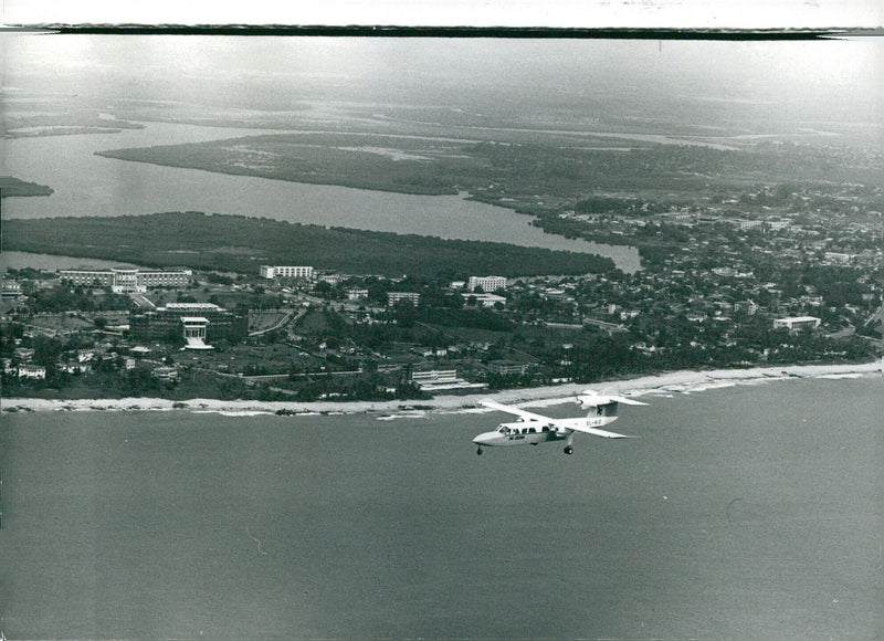 Aerial view of Monrovia, Liberia, reveals the Presidential office and residence and the Parliament building. - Vintage Photograph