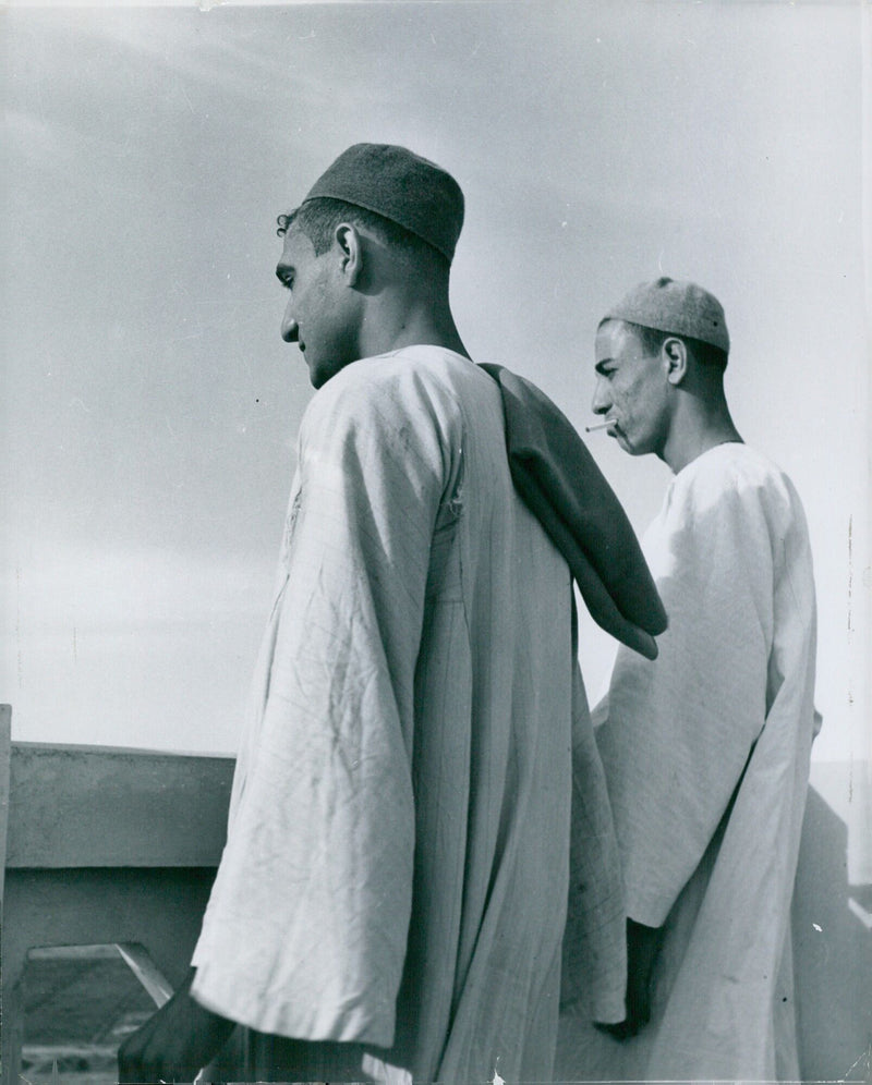 A stunning view of the Mosque Tower in Egypt is captured by H. Franklin from Camera Press London. - Vintage Photograph