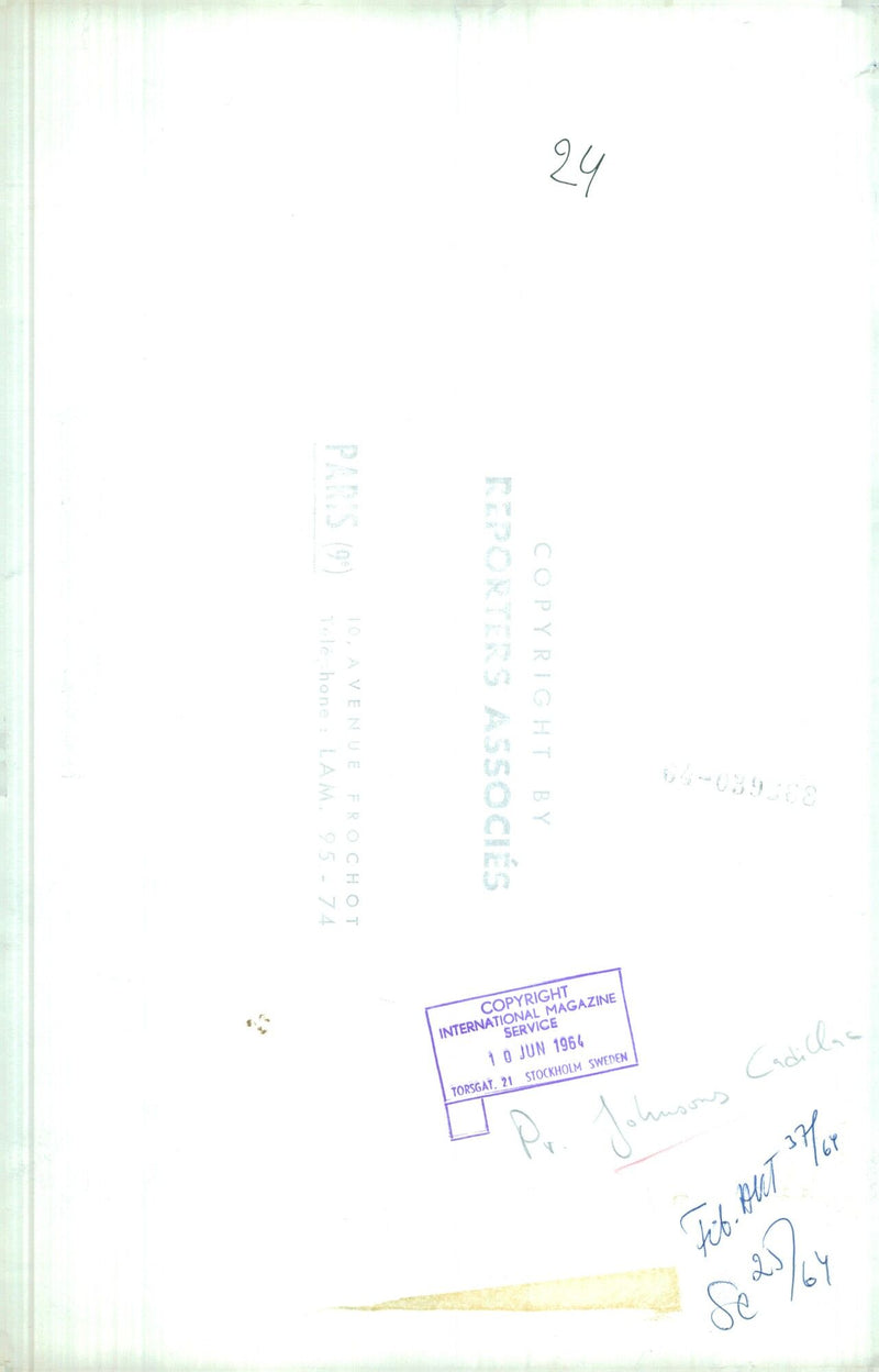 Parisians admire a 1961 Cadillac driven by Johnson on the Avenue Frochot in the 9th district of Paris on December 22, 1961. - Vintage Photograph