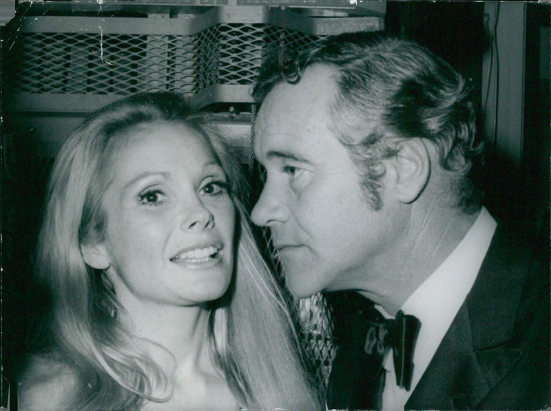 American film star Jack Lemmon and actress wife Felicia Farr pose together in 1972. - Vintage Photograph