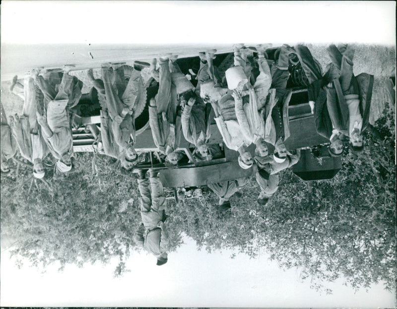 On May 21, 1961, a group of people pause for a moment on the steps of Topsgat. - Vintage Photograph