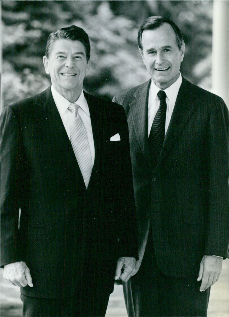 President Ronald Reagan and Vice President George Bush, photographed at the White House in 1981. - Vintage Photograph