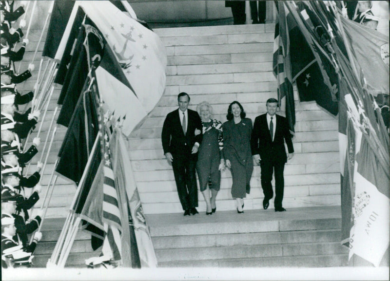 George Bush, his wife Barbara and Vice-President Dan Quayle and Mrs Marilyn Quayle celebrate at the Lincoln Memorial during the inauguration ceremony in 1989. - Vintage Photograph