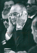 President Lyndon B. Johnson poses for a portrait in 1967. The 36th President of the United States of America, President Johnson succeeded President Kennedy in 1963 and was elected to the Presidency in 1964. - Vintage Photograph