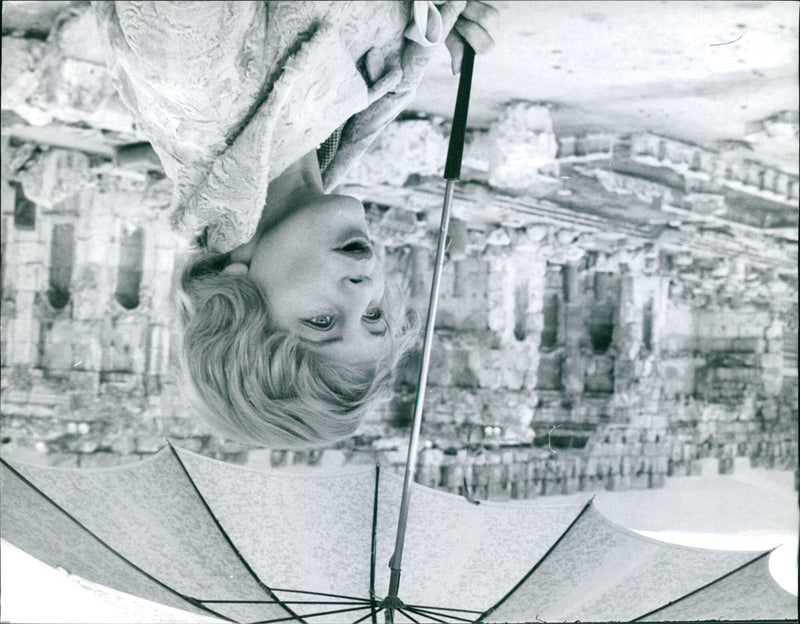 Supporters of Mana Shell cheer during a rally in Paris, France on January 19, 1961. - Vintage Photograph