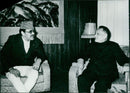 King Birendra Bir Bikram Shah Dev of Nepal welcomes Chinese Vice-Premier Teng Hsiao-ping to the Royal Palace in Kathmandu, February 1978. - Vintage Photograph