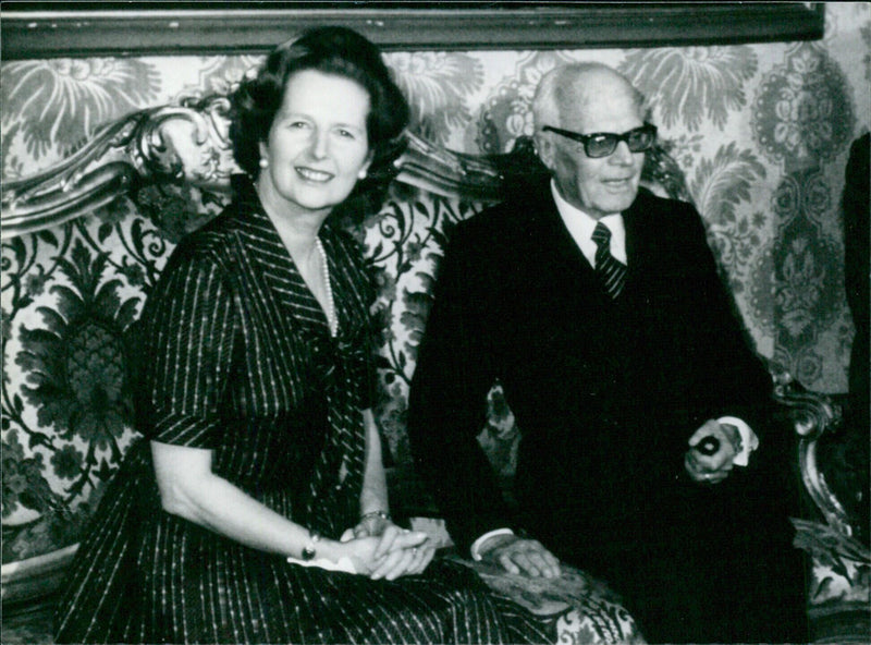 Mrs. Margaret Thatcher, British Prime Minister, is welcomed by President Alessandro Pertini of Italy during her official visit in October 1979. - Vintage Photograph