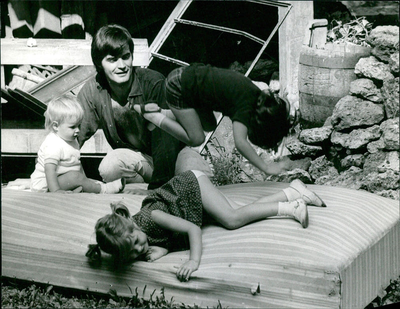 Jean-Claude Drouot and his family of 43 are pictured at their home in Paris, France. - Vintage Photograph
