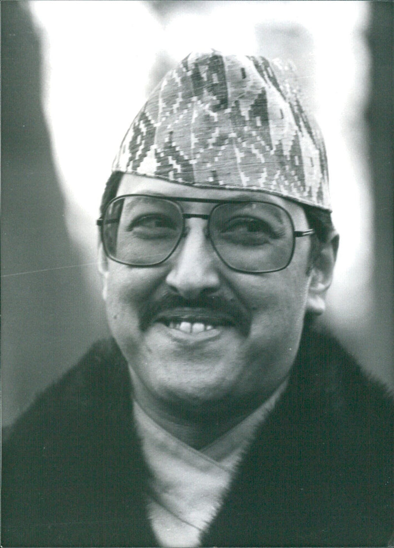 His Majesty King Birendra Bir Bikram Shah Dev, King of the Himalayan Kingdom of Nepal, poses for a photograph in 1980. - Vintage Photograph