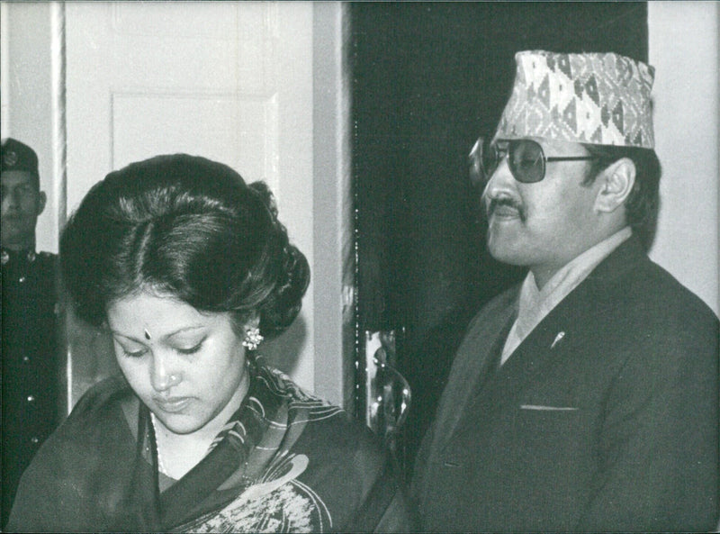 King Birendra and Queen Aishwarya of Nepal pose for a portrait in 1980. - Vintage Photograph