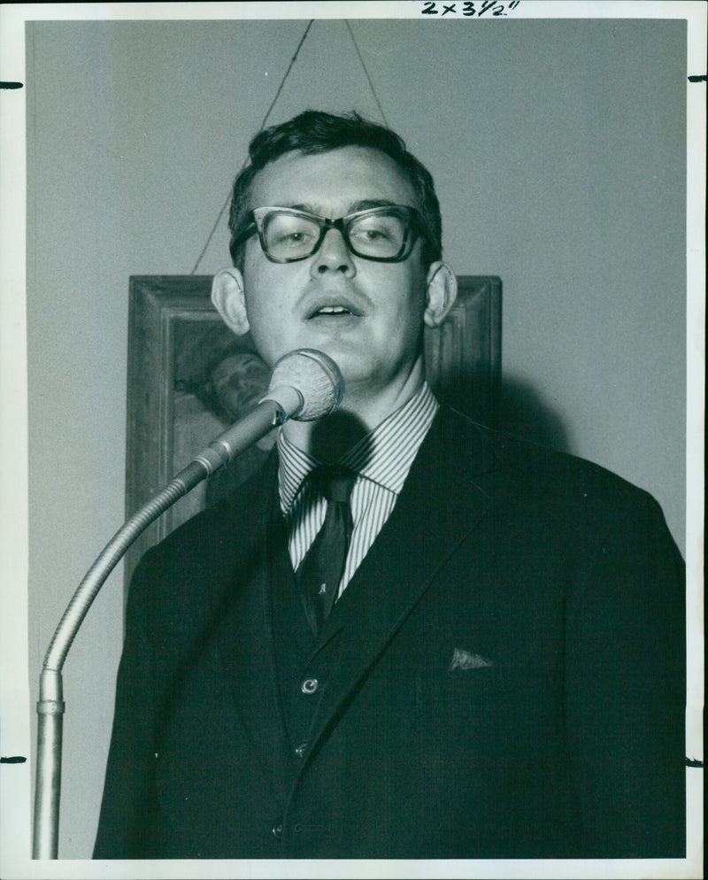 Mr. Jack Good, a poet, speaks about the need for collaboration at a Collelration event in November 1941. - Vintage Photograph