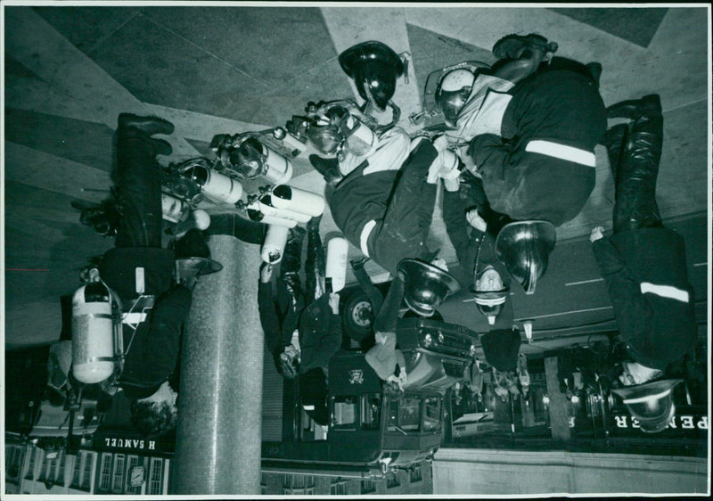 A man wearing a protective mask walks through the streets of Tokyo. - Vintage Photograph