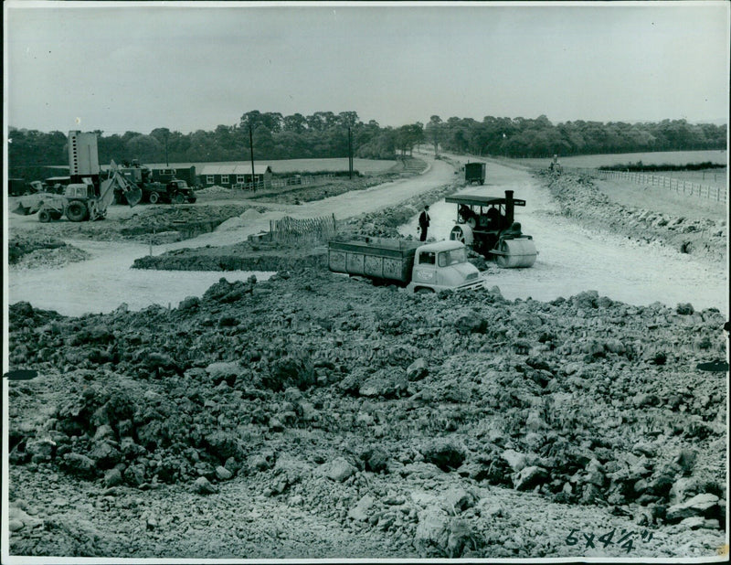 Construction workers building the Eastern By-Pass in Illinois. - Vintage Photograph