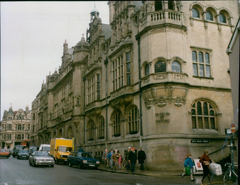 A crowd of people gathered outside Oxford Town Hall. - Vintage Photograph