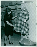 Miss Gasser models a "Vetagetacetal 25 Aquascutum" coat. - Vintage Photograph