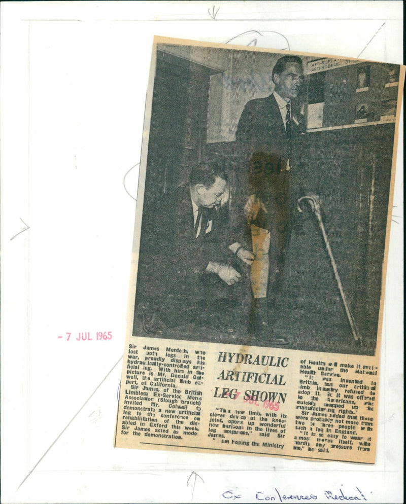 Sir James Lost Mentech proudly displays his legs in the hydraulically-controlled artificial leg during a demonstration at a conference on the rehabilitation of the disabled in Oxford, England. - Vintage Photograph