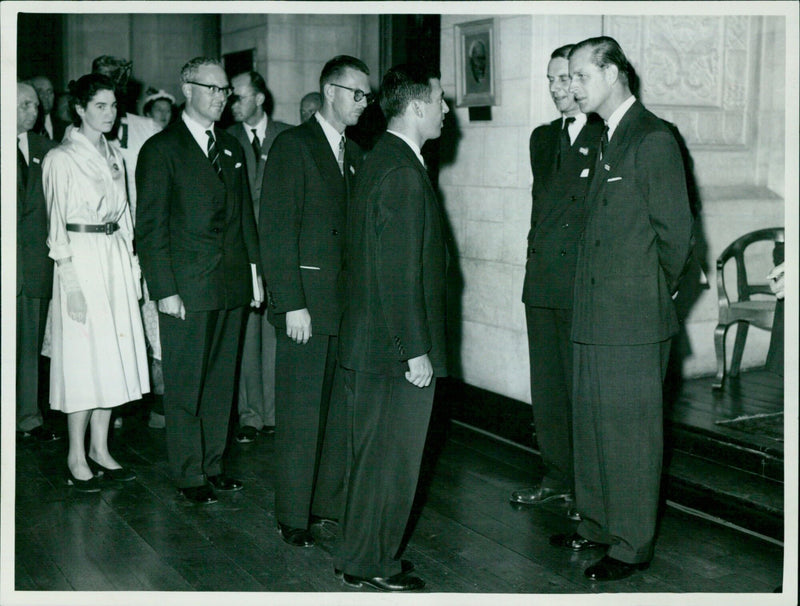 Prince Philip, Duke of Edinburgh, greets delegates of the Commonwealth Conference. - Vintage Photograph