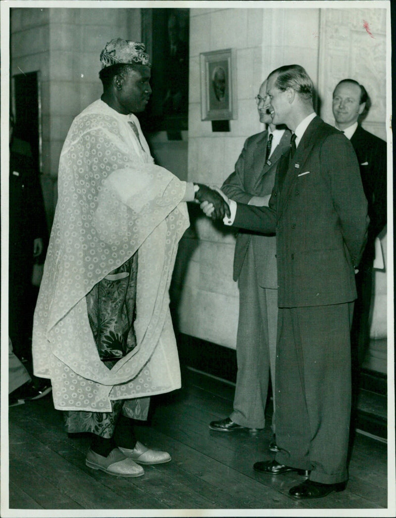 The Duke of Cambridge welcomes a representative from Nigeria at Rodes House. - Vintage Photograph