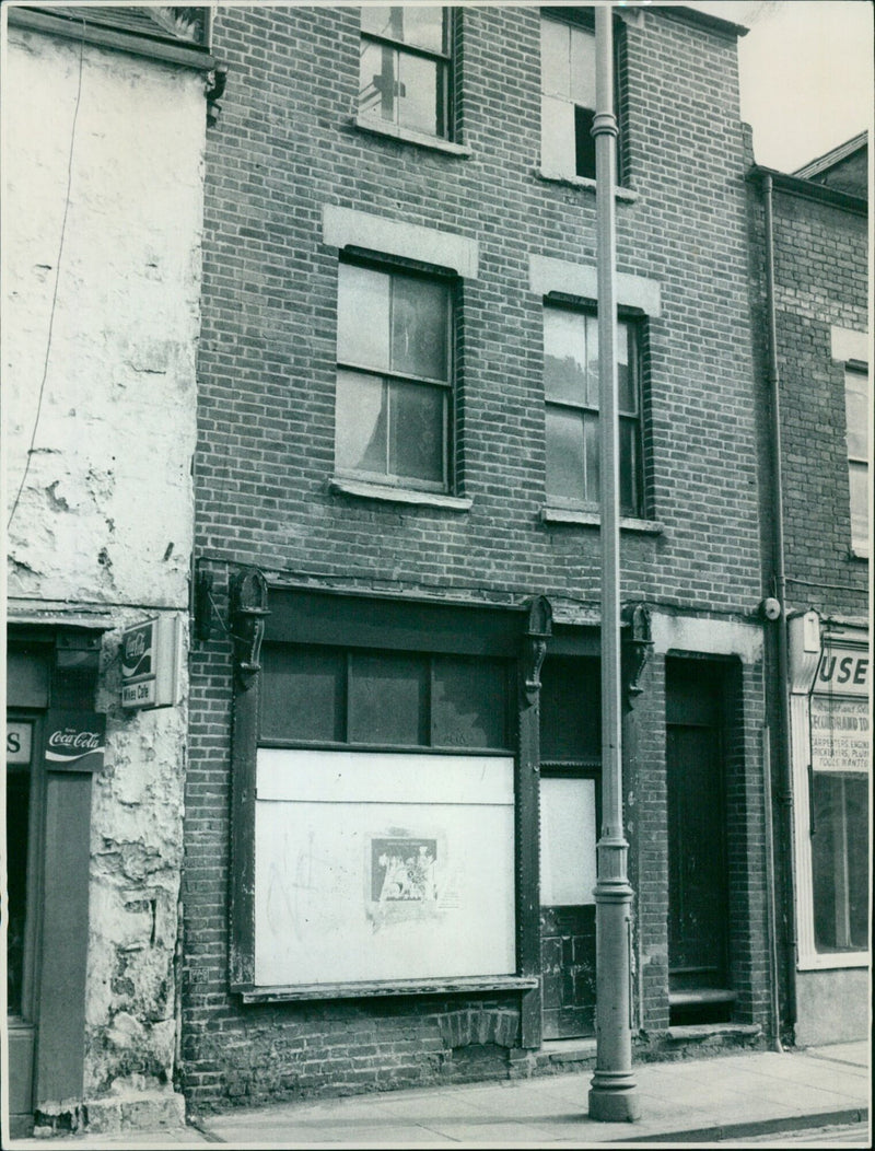 An entrepreneurial family selling second-hand tools and goods on Cowley Road, Oxford. - Vintage Photograph