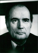 French Politician Francois Mitterrand attends a meeting of the Union of the Left in Paris in 1987. - Vintage Photograph