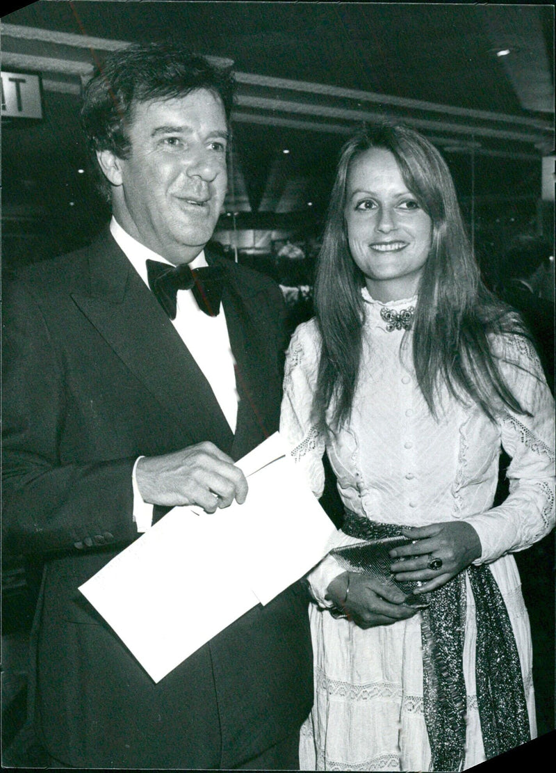 British personalities Russell Harty and Lady Jane Wellesley attend an event in London in 1982. - Vintage Photograph