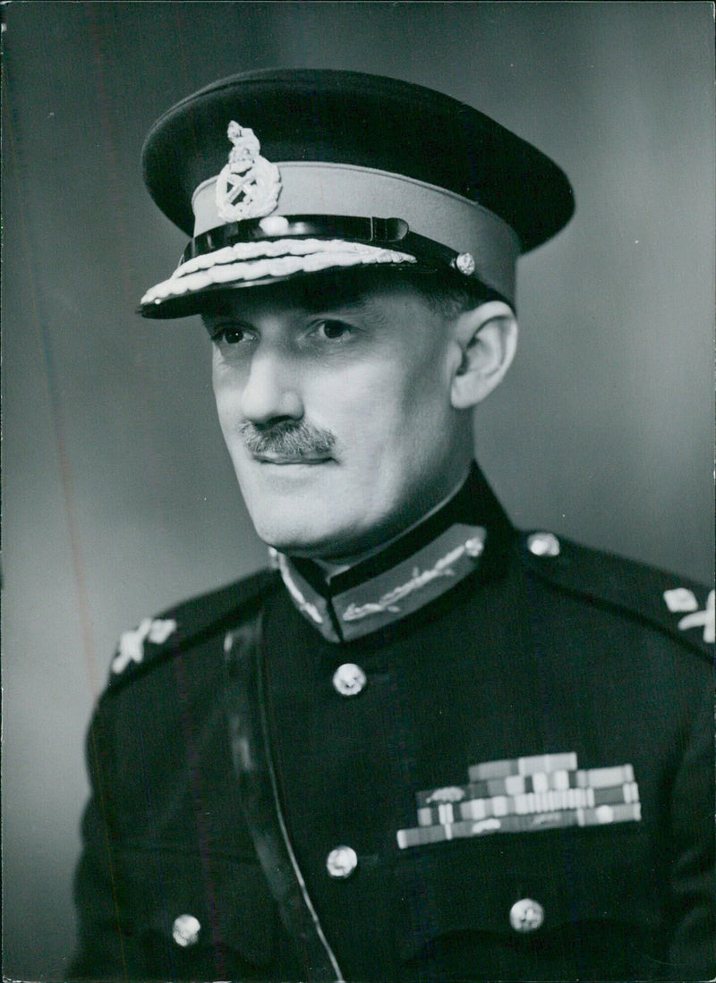 Brigadier J. MacDonald, newly appointed Chief of Staff for HQ Scottish Command, is seen in an official portrait taken by Bassano Studios. - Vintage Photograph